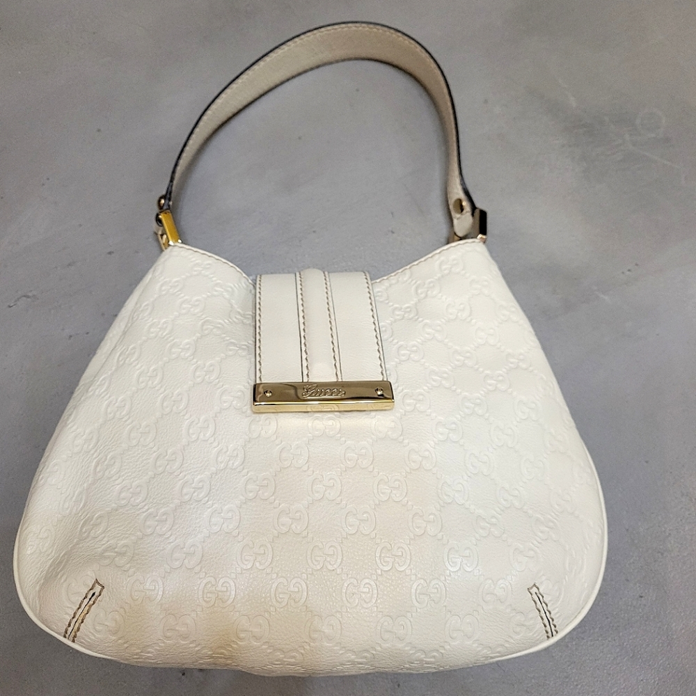 Gucci Ivory Hobo Bag with Gold Accents